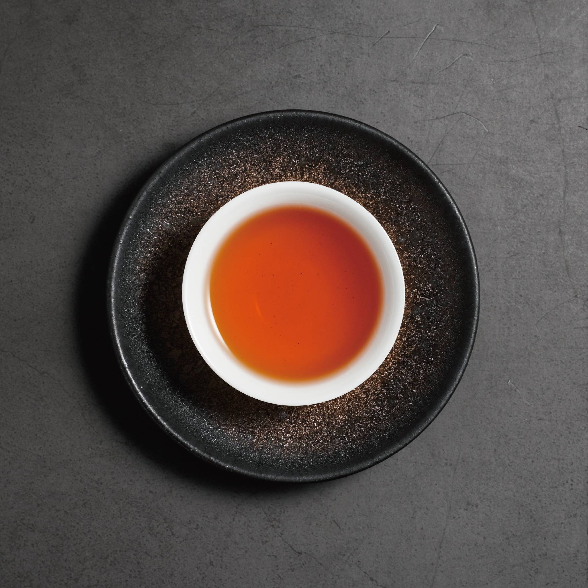 mi xiang honey fragrance black tea tea liquor in cup